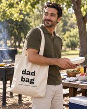 Carrynote dad bag tote in a styled digital lifestyle image.