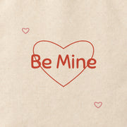 Close-up of the “Be Mine” print on cotton canvas.