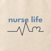 Close-up of the “nurse life” print on cotton canvas.