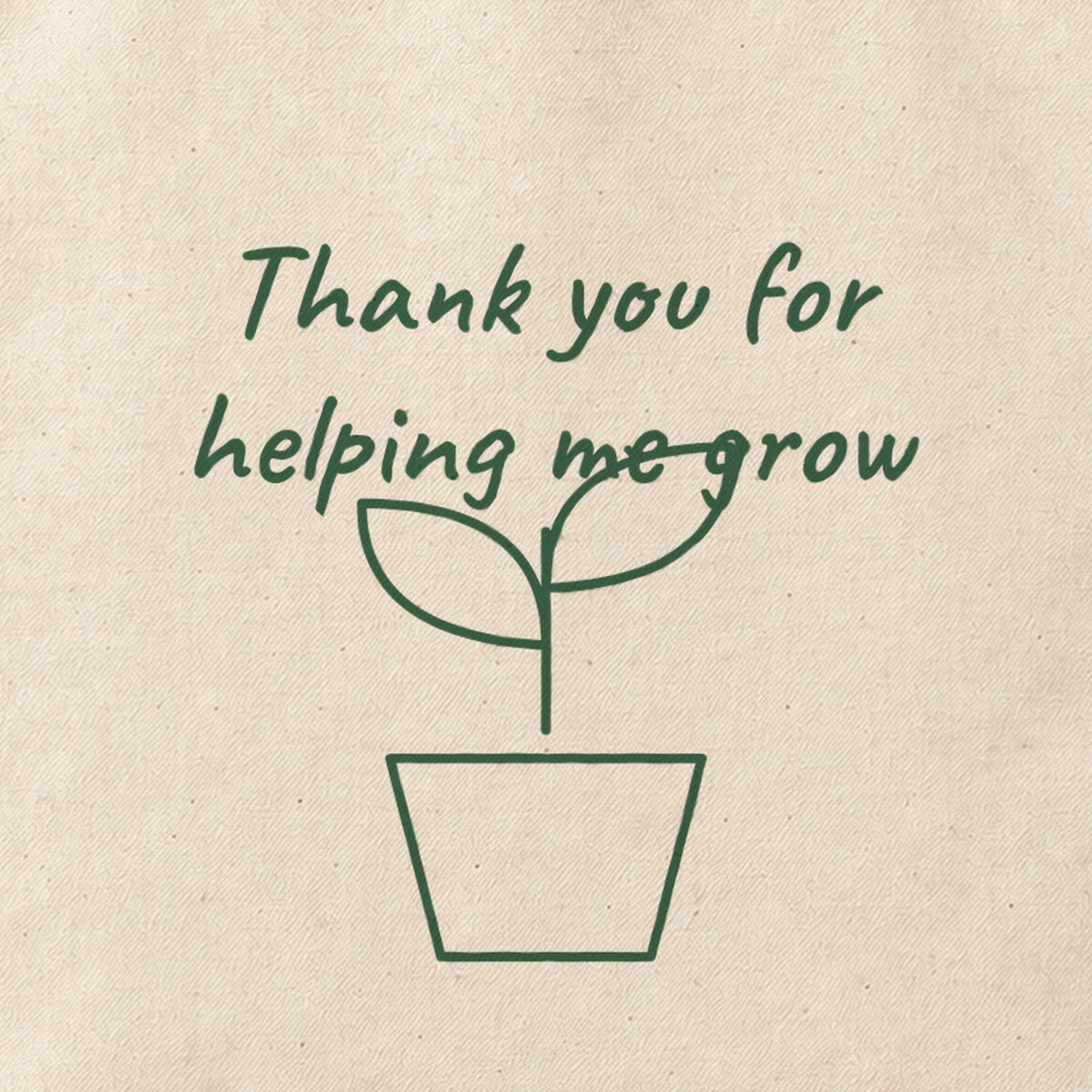 Close-up of the “Thank you for helping me grow” print on cotton canvas.