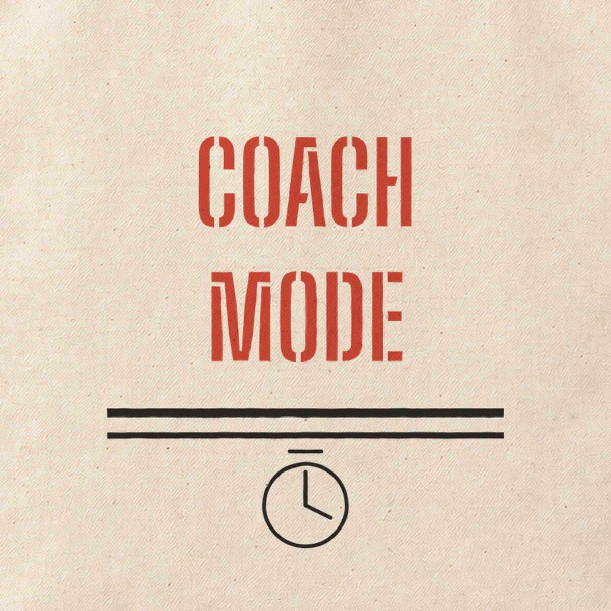 Close-up of the “COACH MODE” print on cotton canvas.
