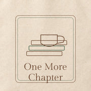 Close-up of the “One More Chapter” print on cotton canvas.